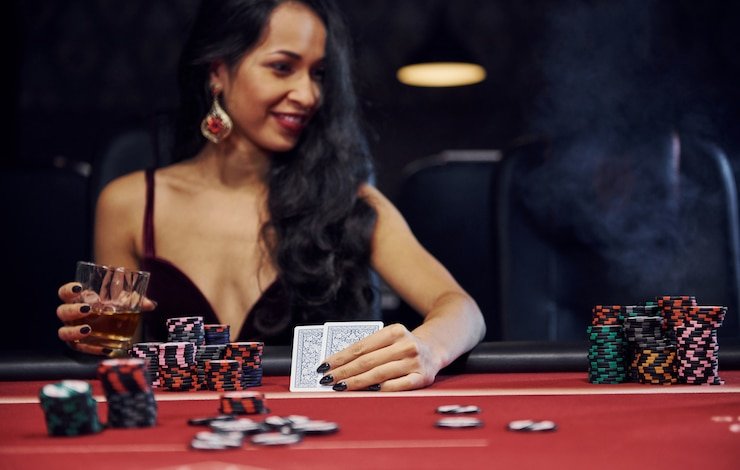 Card dealing animation showing banker and player hands in No Commission Baccarat
